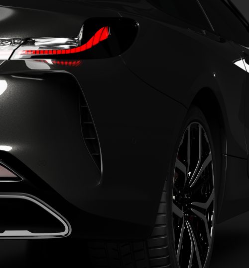 Rear detail shot of modern black premium car in studio light. Brandless modern style. 3D illustration